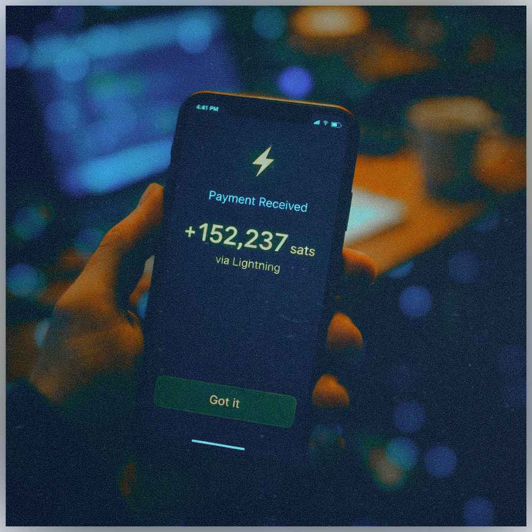 Phone wallet screen showing payment received via Lightning